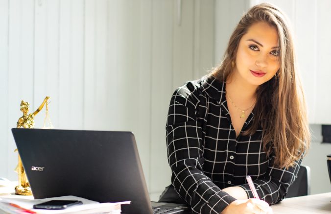 Business Woman signing forms